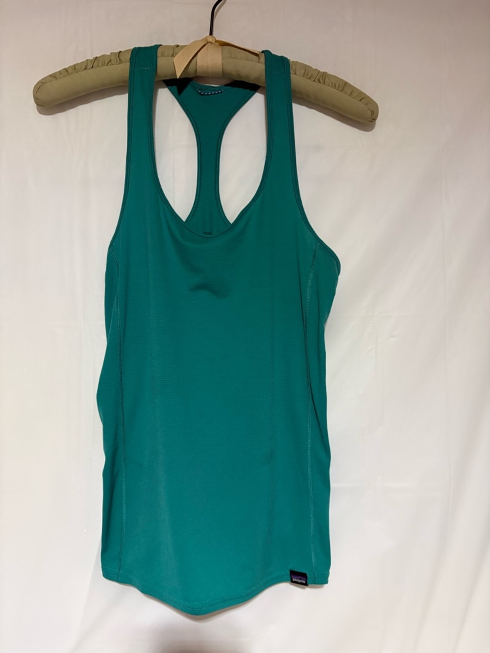 Patagonia Teal Racerback Tank Top please note spot